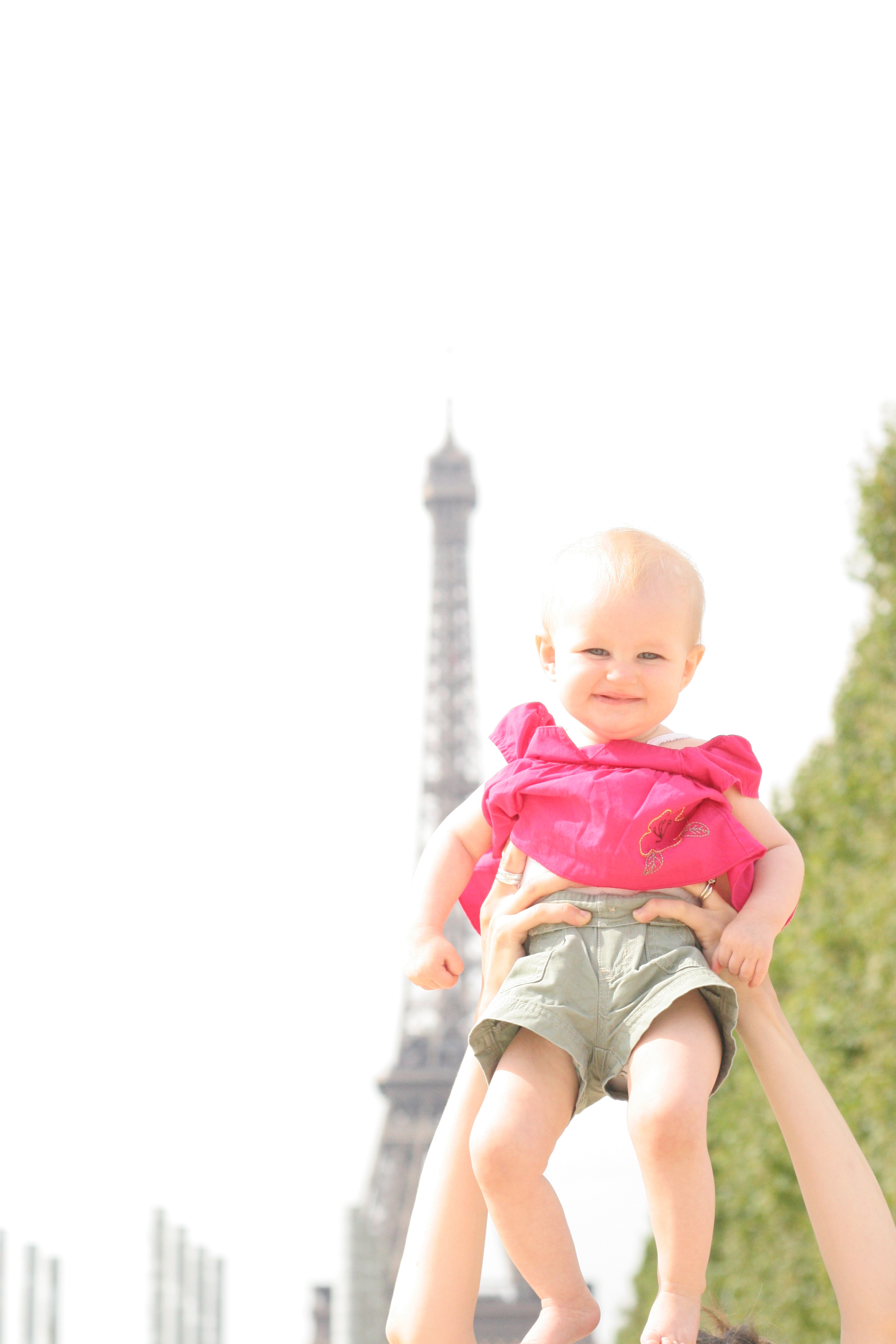 Maisie saying goodbye to the eiffel tower our last day in Paris
